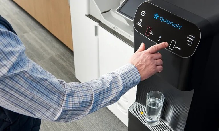 dispensing the q8 hot and cold water dispenser in office