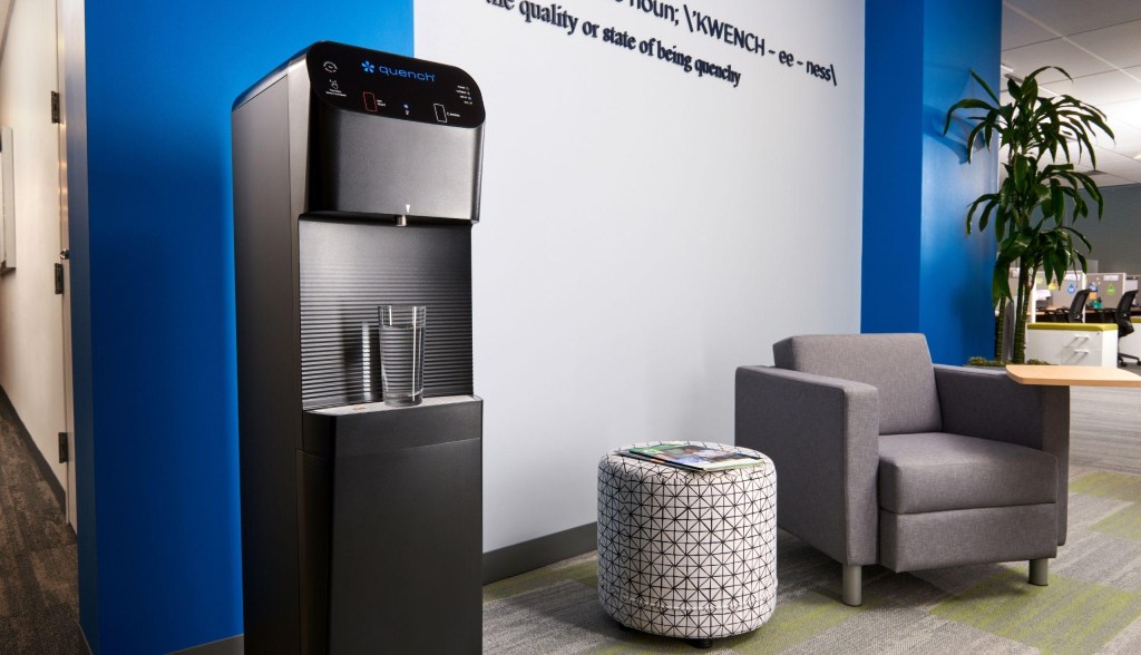 bottleless Quench water cooler with glass of water in office