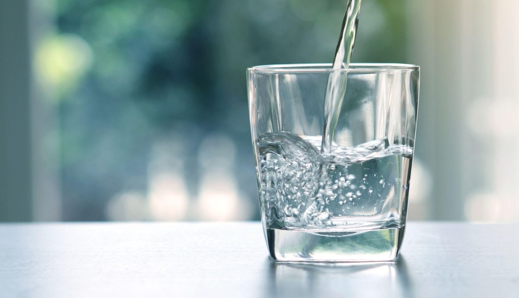 water being poured into glass