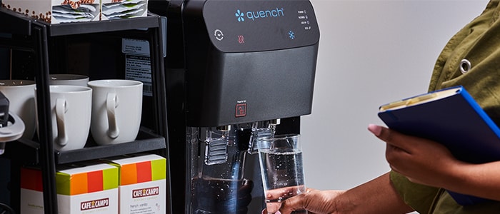 Touchless water cool with woman getting water