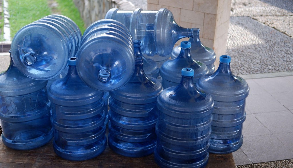 Group of plastic water jugs