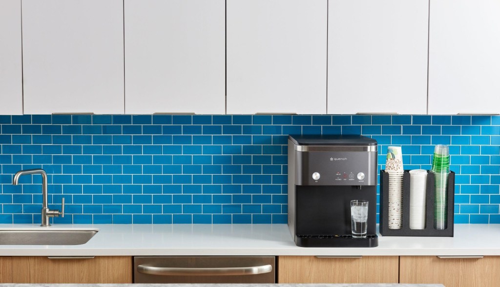 ice water dispenser on counter in breakroom