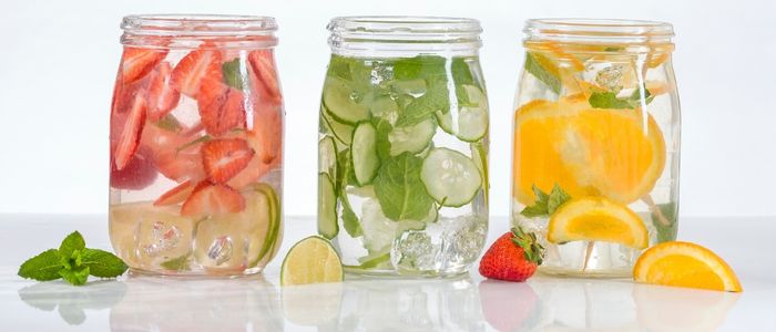 Jars with fruits and water inside