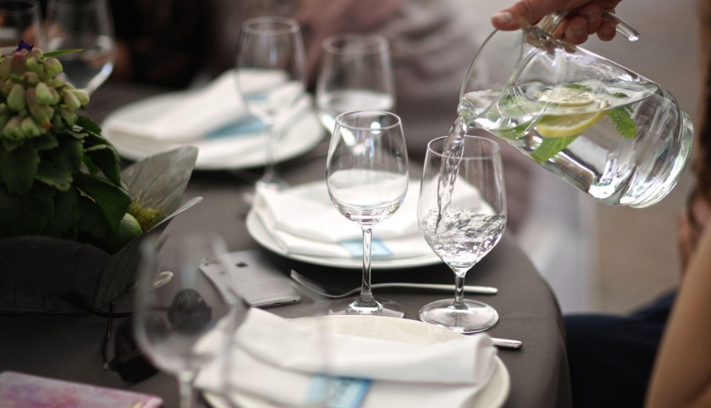 table set at restaurant with glasses