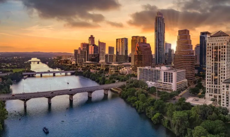 Austin city skyline and bridge with water