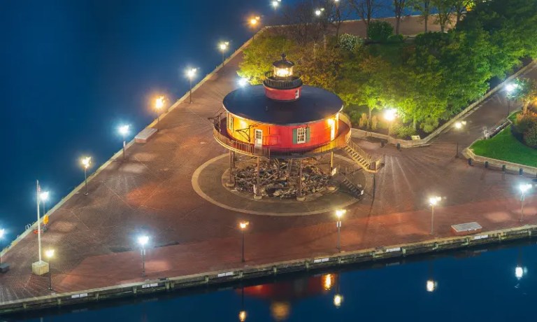 Red lighthouse at night, the Inner Harbor in Baltimore, Maryland