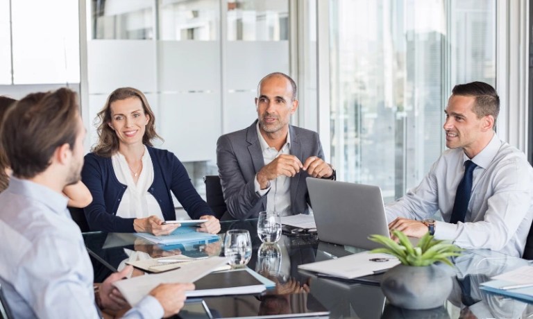 employees having a meeting in an office