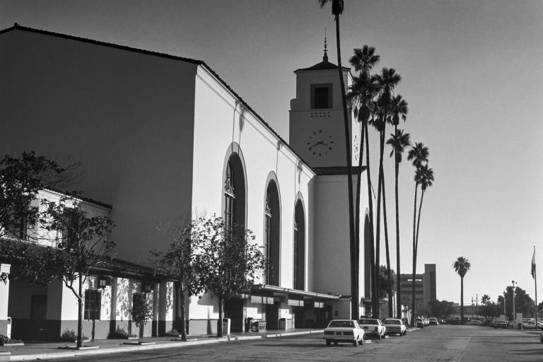 Grainy archival film black and white view of Union Station in downtown Los Angeles, California. Shot in 1984.