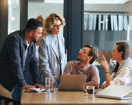 coworkers talking with glasses of water