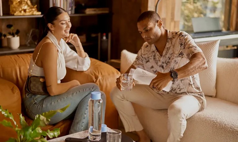 man and woman on couch